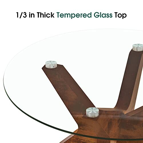 Tempered glass table top with wooden base.